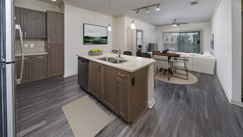 The Hendrix Apartments a kitchen and living room in an apartment at The Hendrix, Atlanta, Georgia